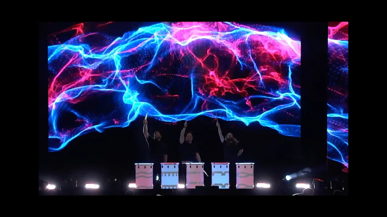LuminaDrums — staged LED drum show at a corporate general session